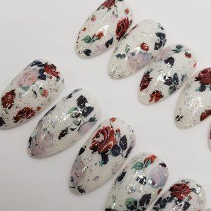 Medium sharp drop of water press on nails.